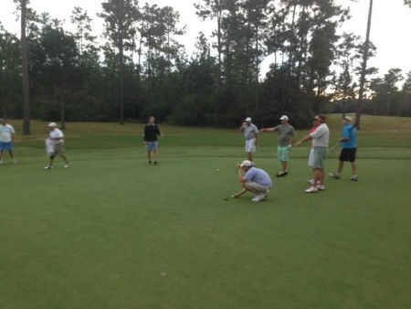 "i think this ball needs to go in that hole!"